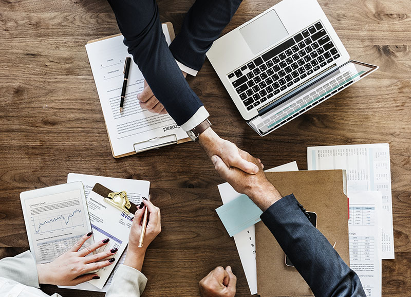 Business handshake in the office Negotiating Negotiate training